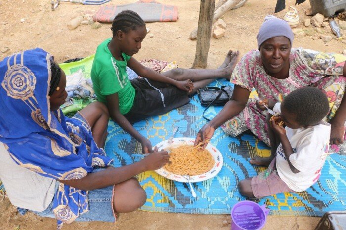 a family is eating their meal