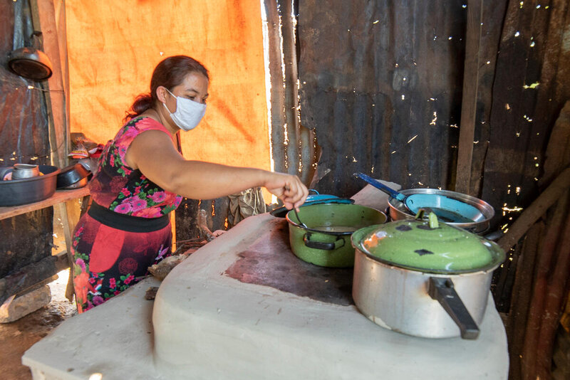 a woman is cooking