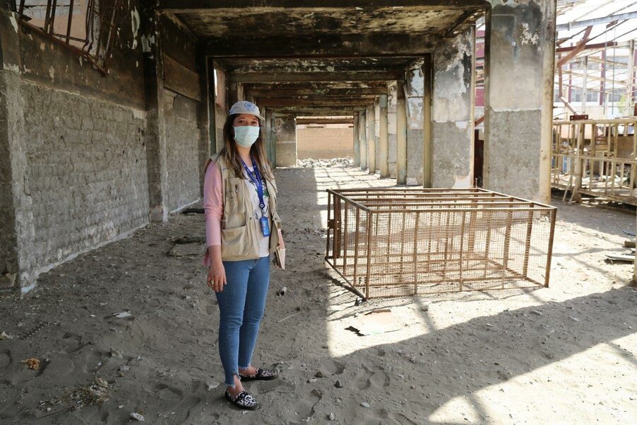 Rania is a WFP staffer from Syria's Deir Ezzor. She stands in a bakery in Deir Ezzor that was destroyed by conflict. WFP staff are working to rehabilitate it so that families can once again access fresh bread.