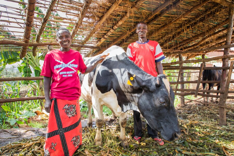 Two dairy farmers in Burundi