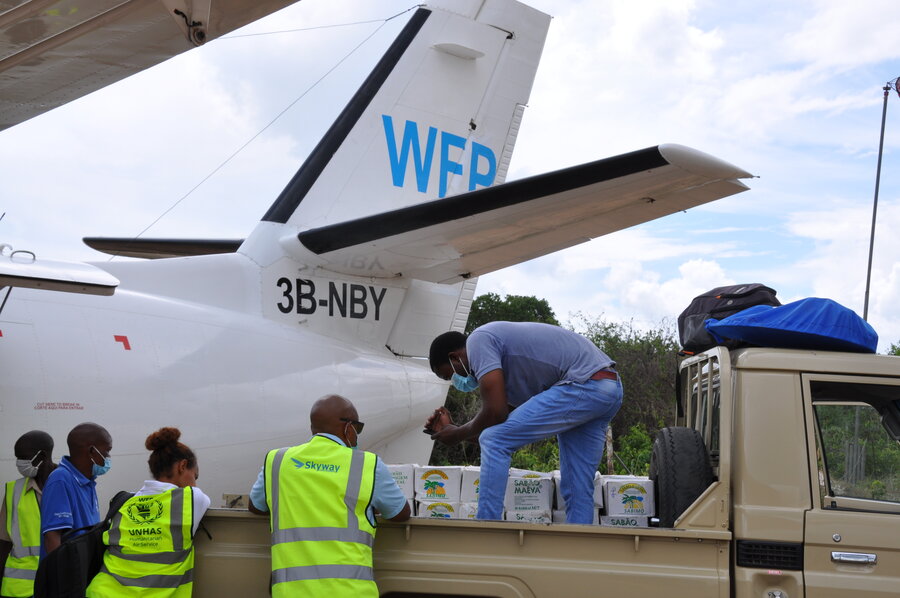 UNHAS flight being loaded with emergency supplies