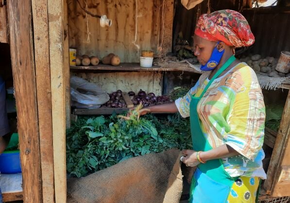 Leah Wairimu received four cash transfers from WFP and used the money to start a grocery business. Photo: WFP/Martin Karimiiness in the Nairobi