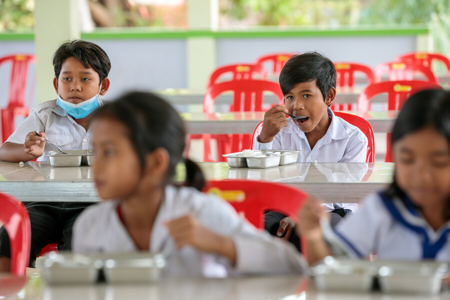 Children eating at tables