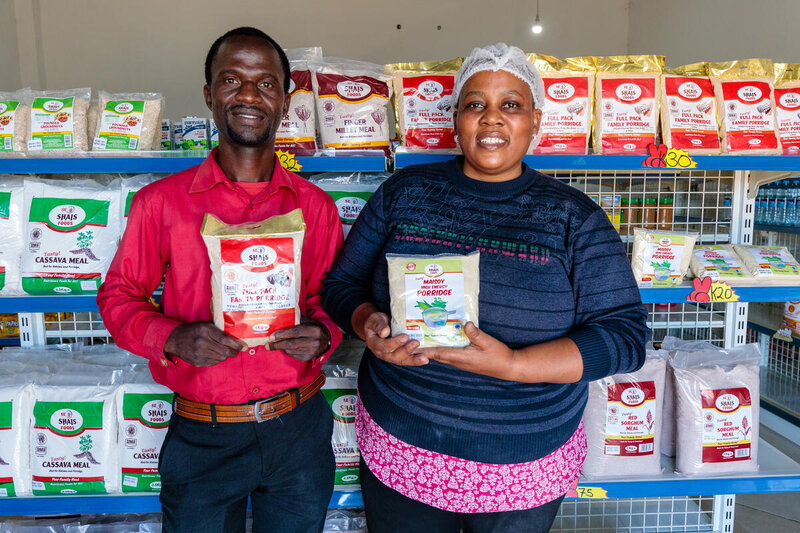 Good Food Logo -- Business owner Mirriam and salesman Valentine in their shop in Lusaka, Zambia.