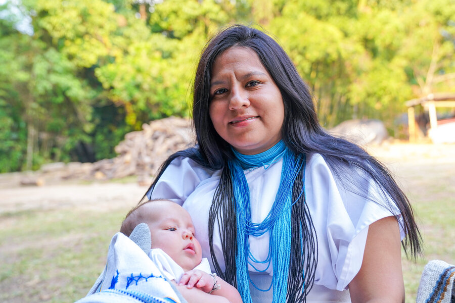 Woman holding child