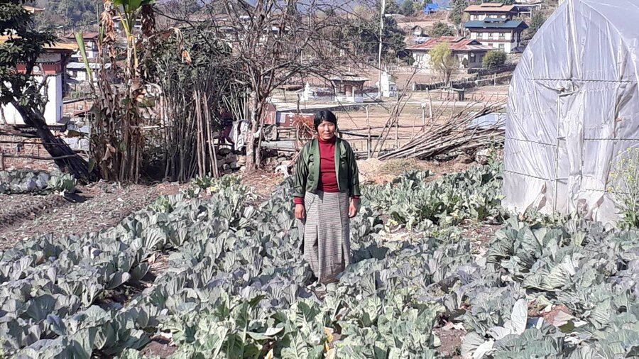 Woman standing in field