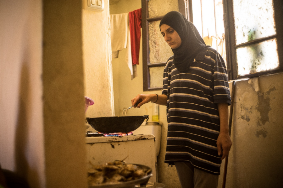 It’s lunch time at Mona’s. She now relies on humanitarian assistance from WFP to put food on the table. Photo: WFP/Giulio Origlia