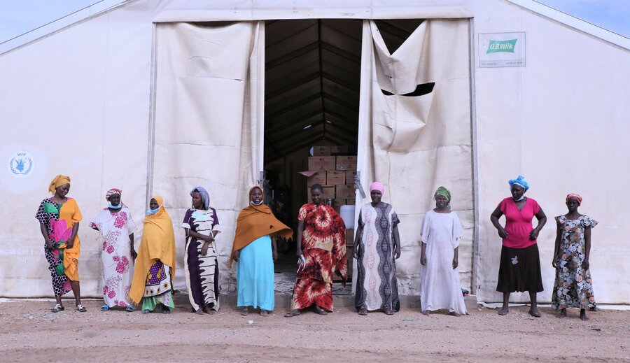 9.	Ten of the 15 women working at WFP’s warehouse in Hola, Tana River County