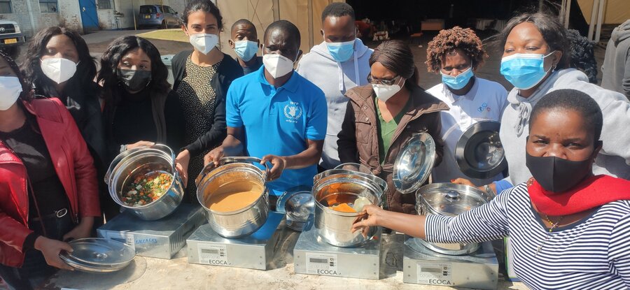 people showing electric cookers