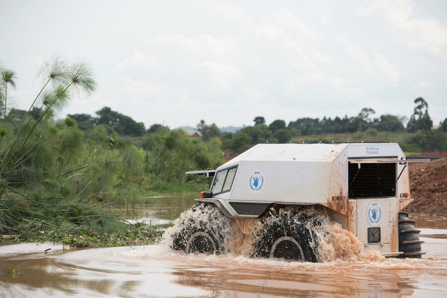 all-terrain vehicle crossing swamp