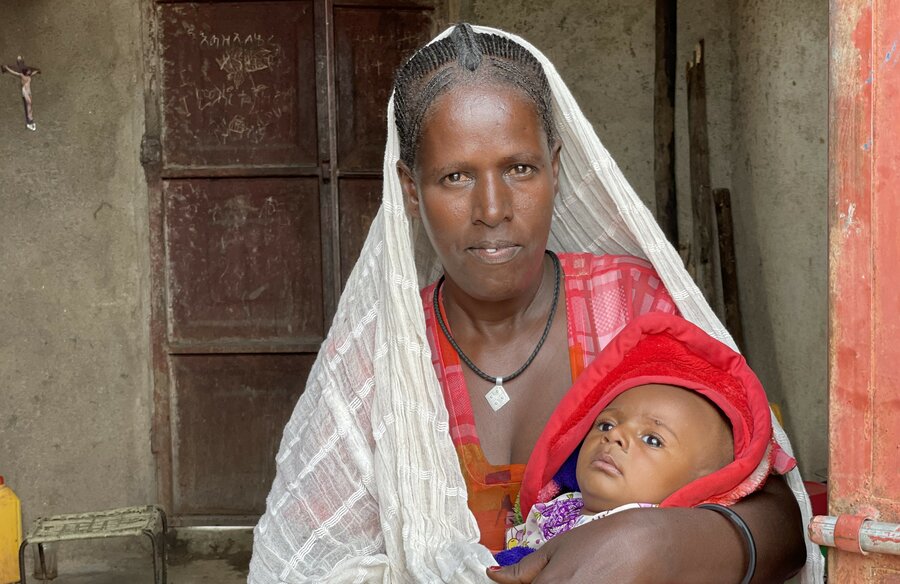 Letemariam Lakaw and her family pose for a picture. Photo: WFP/Claire Nevill