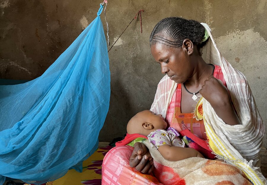 Letemariam Lakaw and her family pose for a picture. Photo: WFP/Claire Nevill