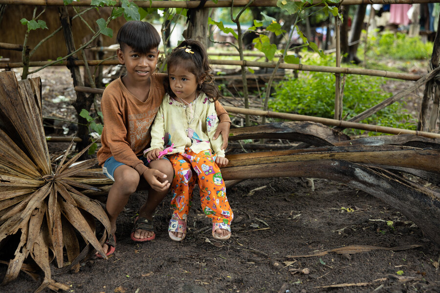 11-year-old Mouy Mai and his younger sister at home in Kampong Chhnang province, Cambodia.