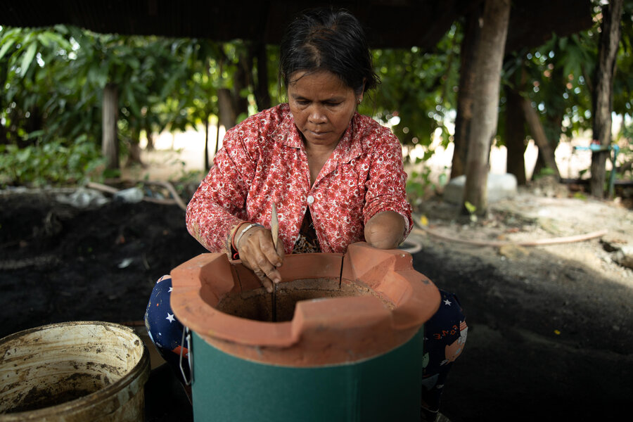 Nach Pov, a single mother who works as a pot maker and rice farmer in rural Kampong Chhnang province in Cambodia. 