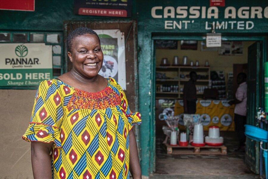 Ederbry Mweendo, Director of Cassia Agro Enterprises, outside her shop in Monze District, Zambia. Photo: WFP/Catherine Zulu. 
