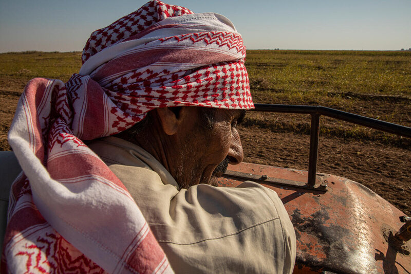 Khalaf looking at his now productive land