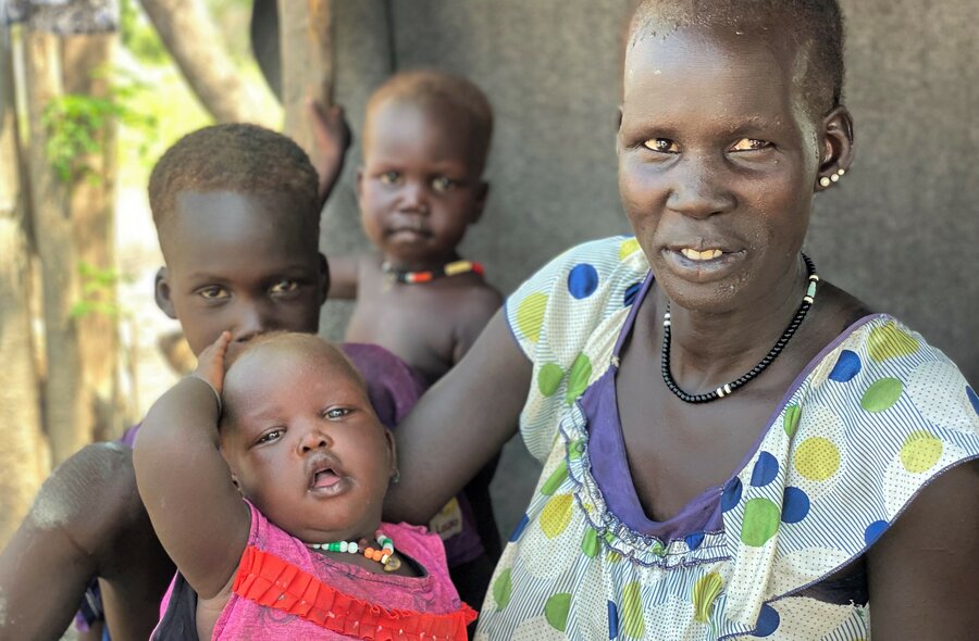 Many residents have fled the flooded village of Paguir but Nyaloka Puok and her family have chosen to stay. Photo: WFP/Marwa Awad