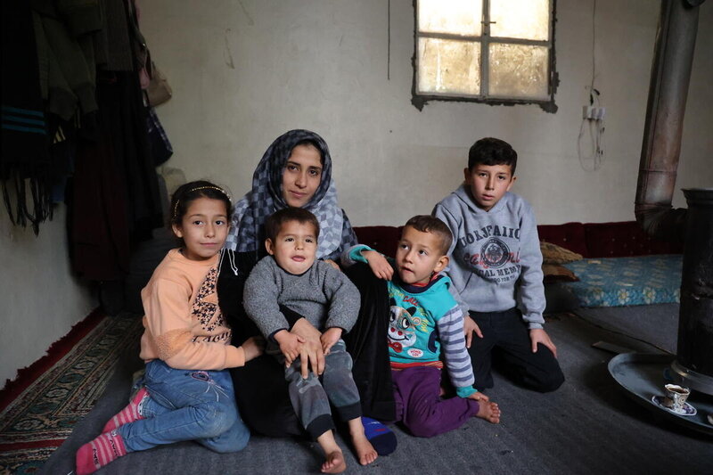 Issa at home with her children