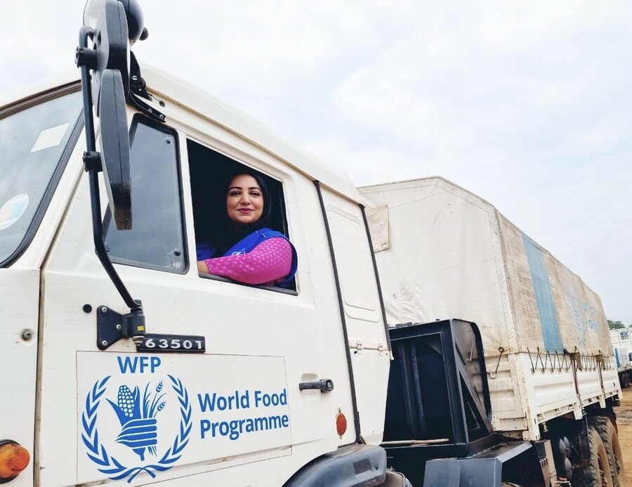 Woman inside WFP truck