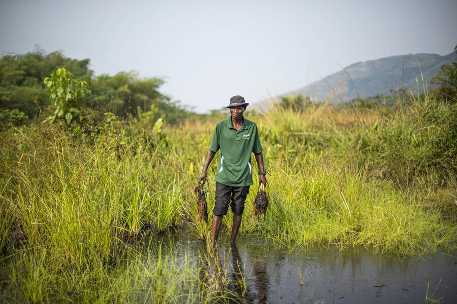 Fish farmer Masuisse in Kinduti in DRC. Photo: WFP/Castofas