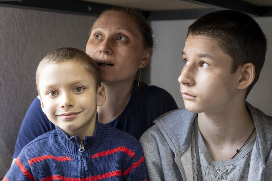 Liubov and her sons displaced in Poltava. Photo: WFP/Reem Nada 