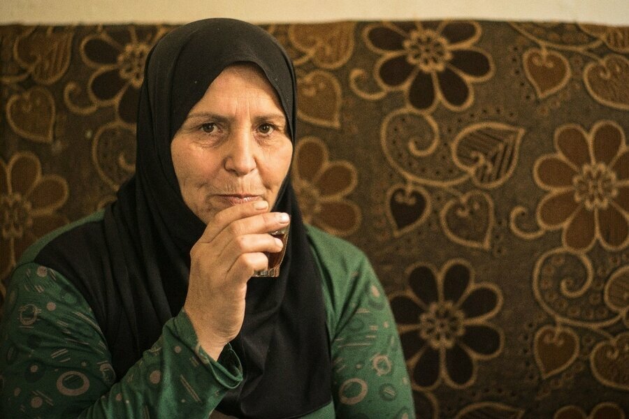 Rokati uses tea to keep hunger pangs at bay. Photo: WFP/Giulio Origlia