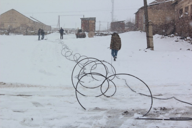 Community members preparing to install the new irrigation system.  Photo credit: WFP/Mariam Avetisyan