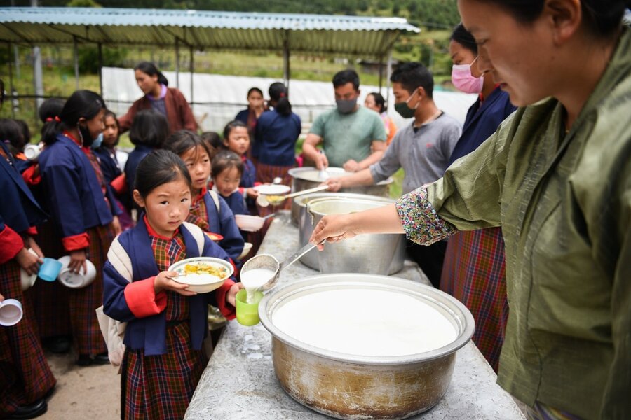Children line up for lunch in Ura Central School @WFP/Kinley Wangmo