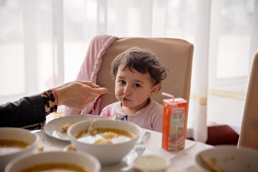 Pepege eating a WFP hot meal at a Refugee Reception Center, Moldova. Photo: WFP/Cassandra Prena