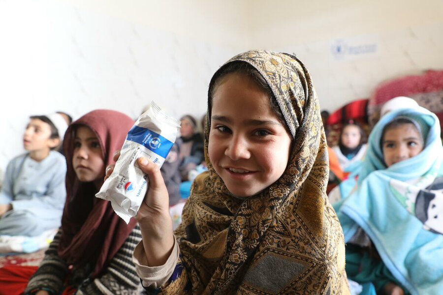 WFP reaches half-a-million primary school students like Shigafa, 7, with locally produced, high-energy snacks. Photo: WFP/Sadeq Naseri