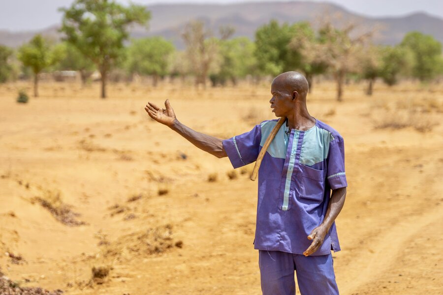 WFP distributed climate insurance payouts to farmers in Burkina Faso like Karim Sore, following last year's crippling drought. Photo: WFP/Cheick Oumar Bandaogo