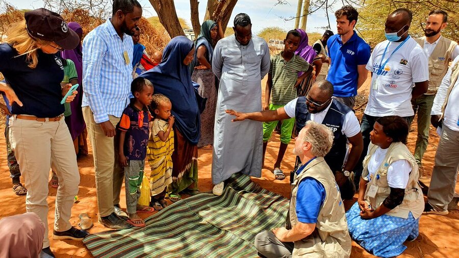 WFP Executive Director David Beasley speaks to families receiving food assistance in Kenya. Our operating costs have skyrocketed this year. WFP/Martin Karimi