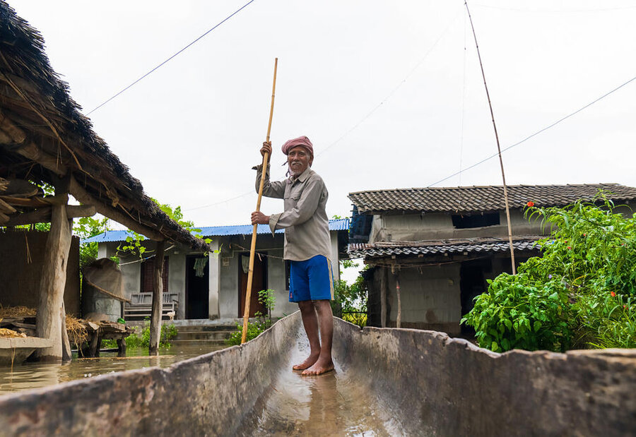 The funds reached, Bhagiram Sunaha in western Nepal, who lost his home and possessions in the del-uge — but rescued his family and livestock with his rickety wooden boat. “This is the first time I have received this kind of support,” says Bhagiram, who is spending it on food. “I am very happy.”  PIC-CAP