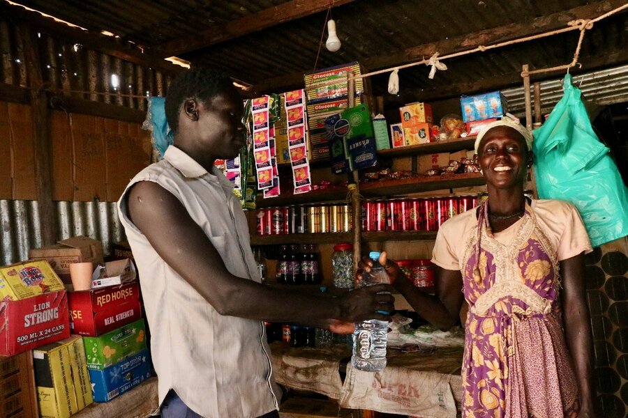 Magret Achi's business is booming thanks to the new road running through her village. Photo: WFP Musa Mahadi.