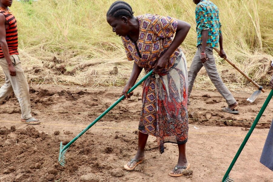 Mother of six Achalla Uguak hopes to open a restaurant with the money she's earning from the roads project. Photo: WFP/Eulalia Berlanga