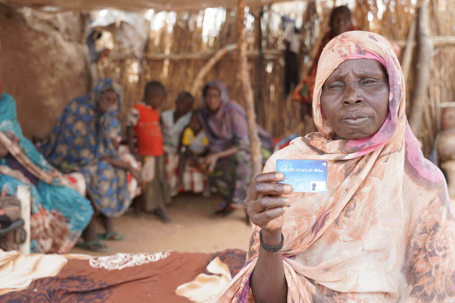 Mother of 10 Hauwa Mustapha finds even a cup of flour is more expensive. Photo: WFP/Leni Kinzli