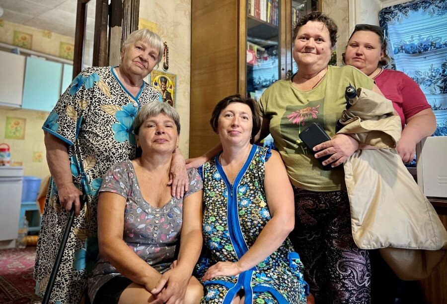 Natalia (2nd from left) and her neighbours. Photo: WFP/Edmond Khoury