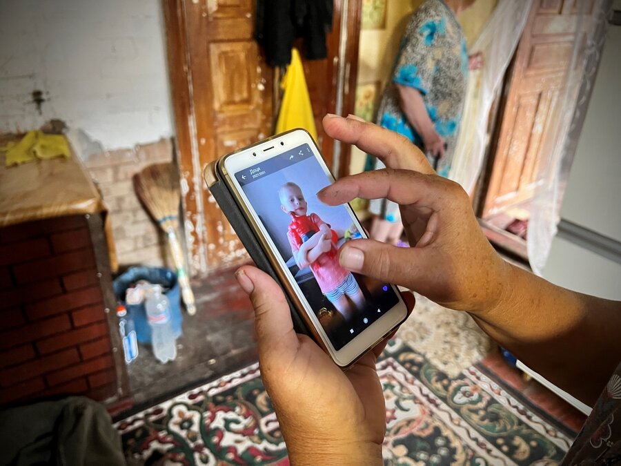 Natalia receives regular updates about her daughter and grandson in Warsaw. Photo: WFP/Edmond Khoury