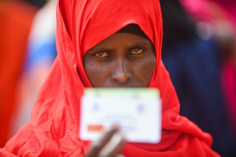 A woman in Bukoyar near Gode in Ethiopia with a WFP cash transfer card. Photo: WFP/Michael Tewelde