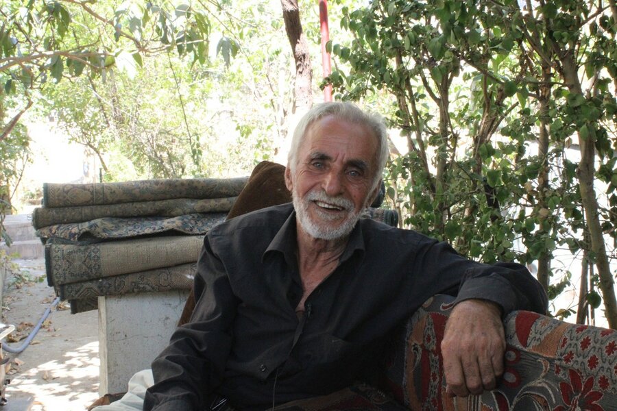 Hasan has more than 45 years of experience in planting. He’s grown many of the plants around his house. Photo: WFP/Dana Houalla