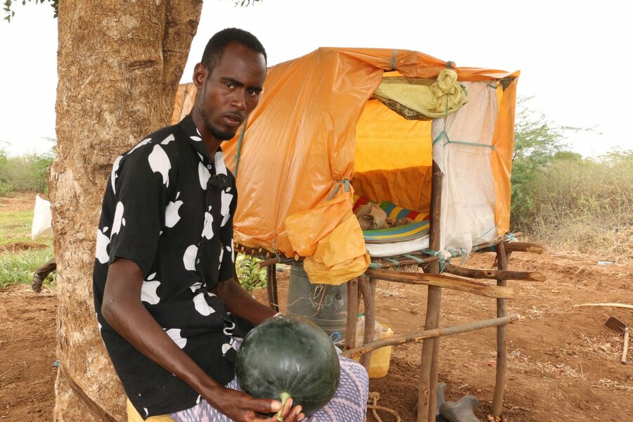 Abdi Raman gets collects his freshly harvested melon to sell in the local market. Photo: WFP/Martin Karimi