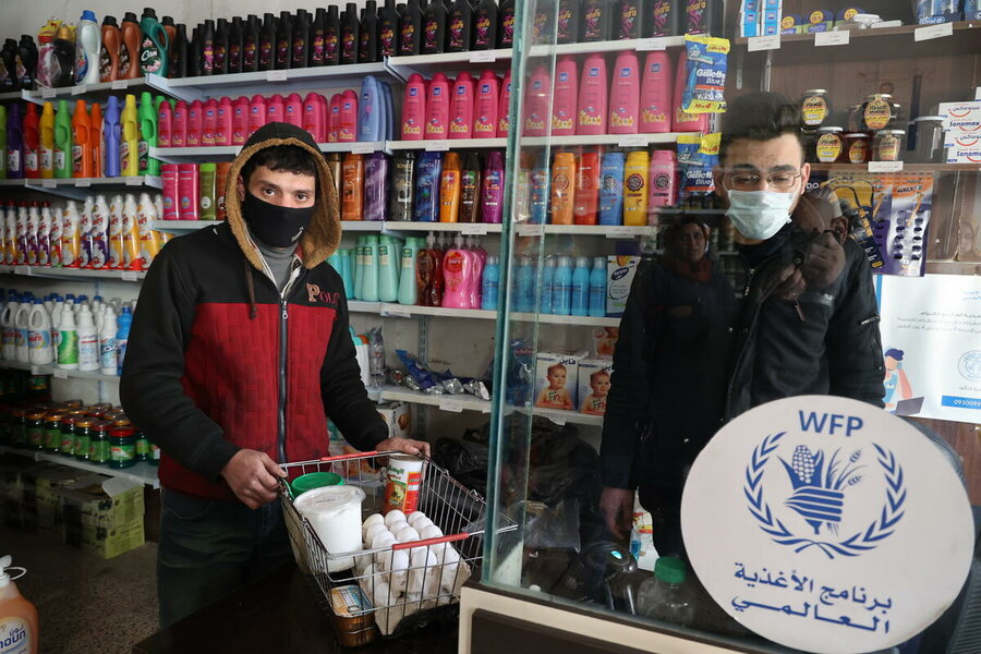 Mohammed and his family receive both in-kind food from WFP and cash assistance