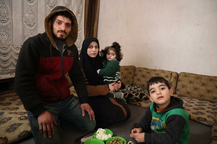 Syrian family, at home in Aleppo, take breakfast late so they won't need lunch