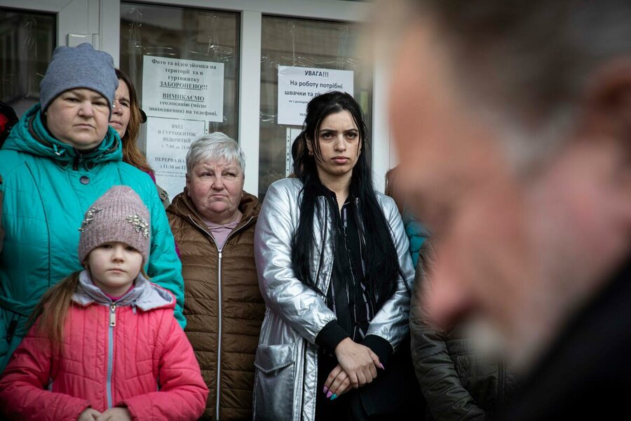 David Beasley with people in Rivie, Ukraine, in April. 