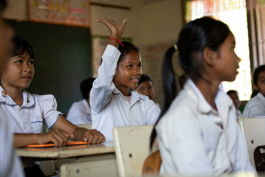In this photo Ouy Heng (14, in Grade 6) attends a mathematics class at Bos Thom school in Siem Reap province.