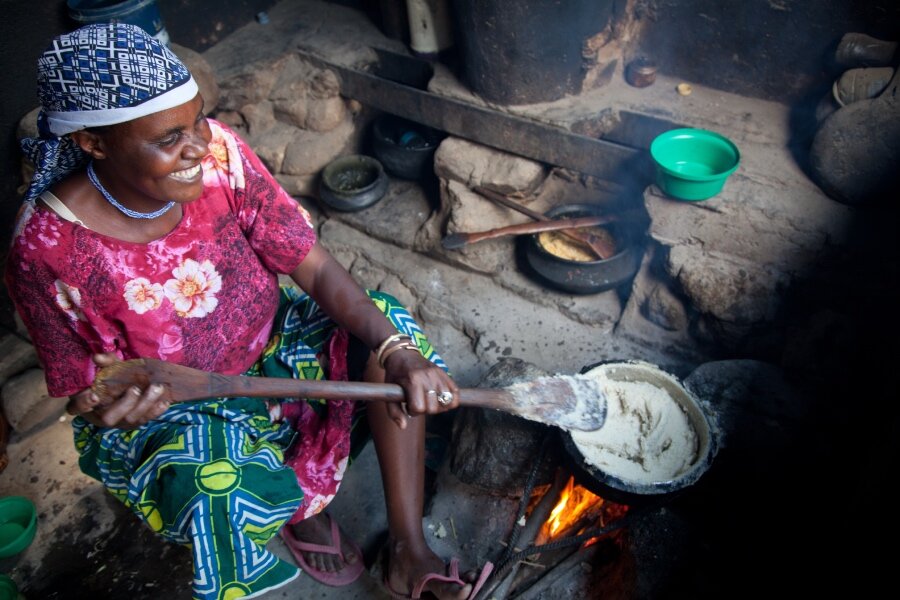 Traditional cooking like this in Tanzania has helped drive rampant deforestation. WFP is working with civil society groups and the Government to deliver clean and green alternatives. Photo: WFP/Jen Kunz