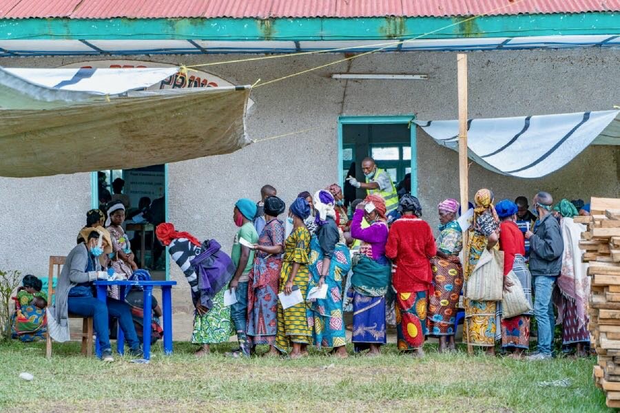 People line up for WFP assistance in northeastern DRC's Masisi region. Photo: WFP/Michael Castofas