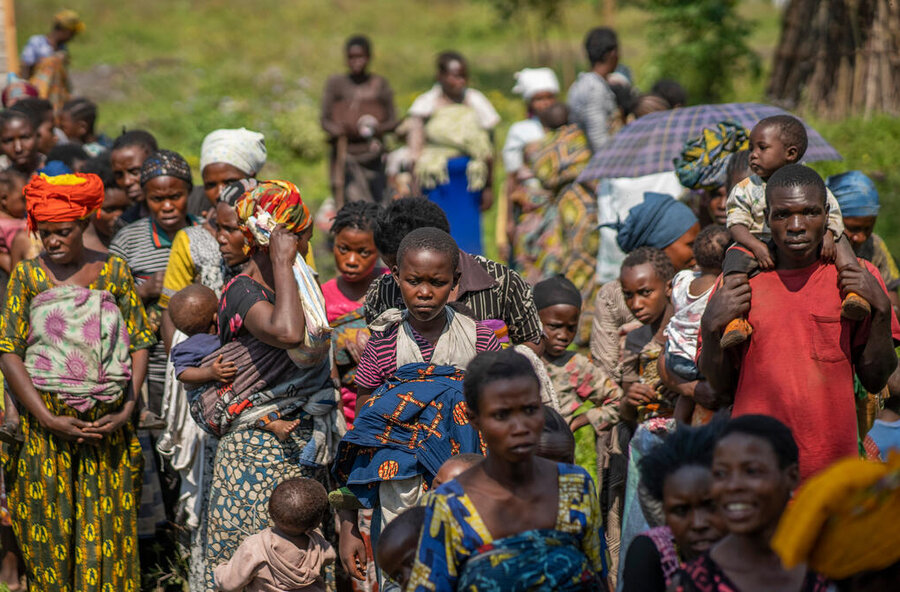 Pregnant and breastfeeding women line up for assistance at a WFP-backed clinic in North Kivu