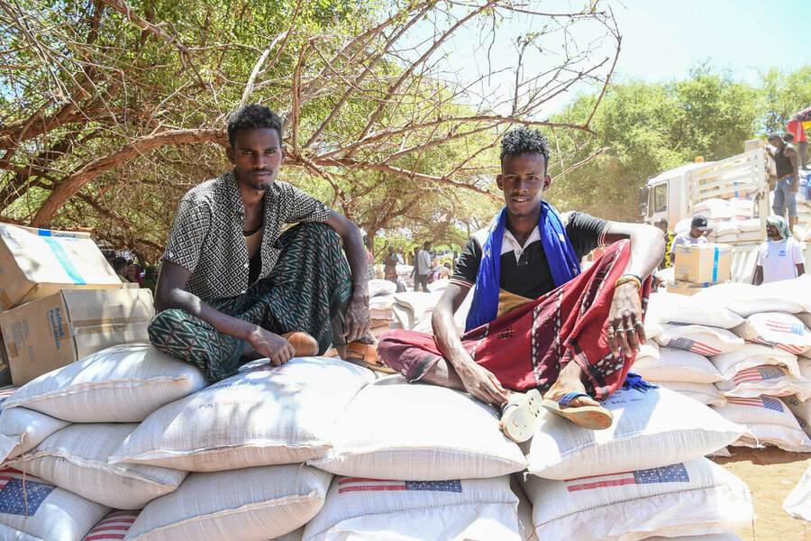 A break during a food distribution in Bokh, Ethiopia, for refugees from Somalia in April. Photo: WFP/Melese Awoke