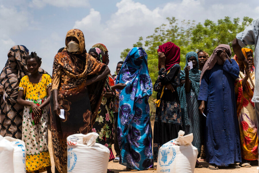 The first food distribution by WFP at Wad Almajzoub farm camp